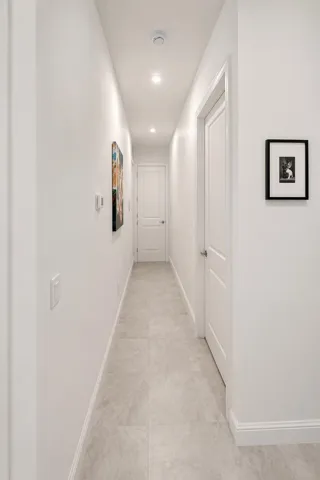 Designer.Hallway to Guest Room and Garag
