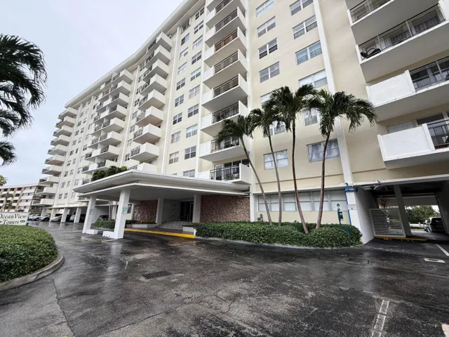 BLDG FRONT & PARKING SPACE