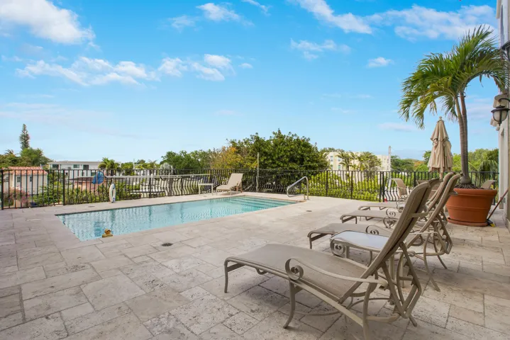 Community Rooftop Pool with a Swim Spa feature for resistance swimming