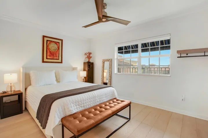Second Bedroom has new hardwood flooring, expanded closets, and electric blinds