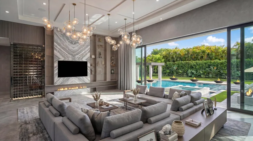 Living Room with 16.5 ft. ceilings and pool deck access