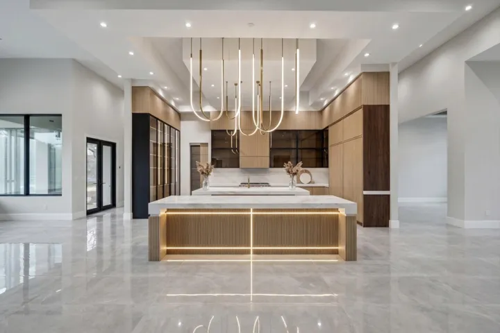 Chefs Kitchen features a double island, custom cabinets, quartzite counters, Miele and Sub Zero appliances, and butlers pantry.