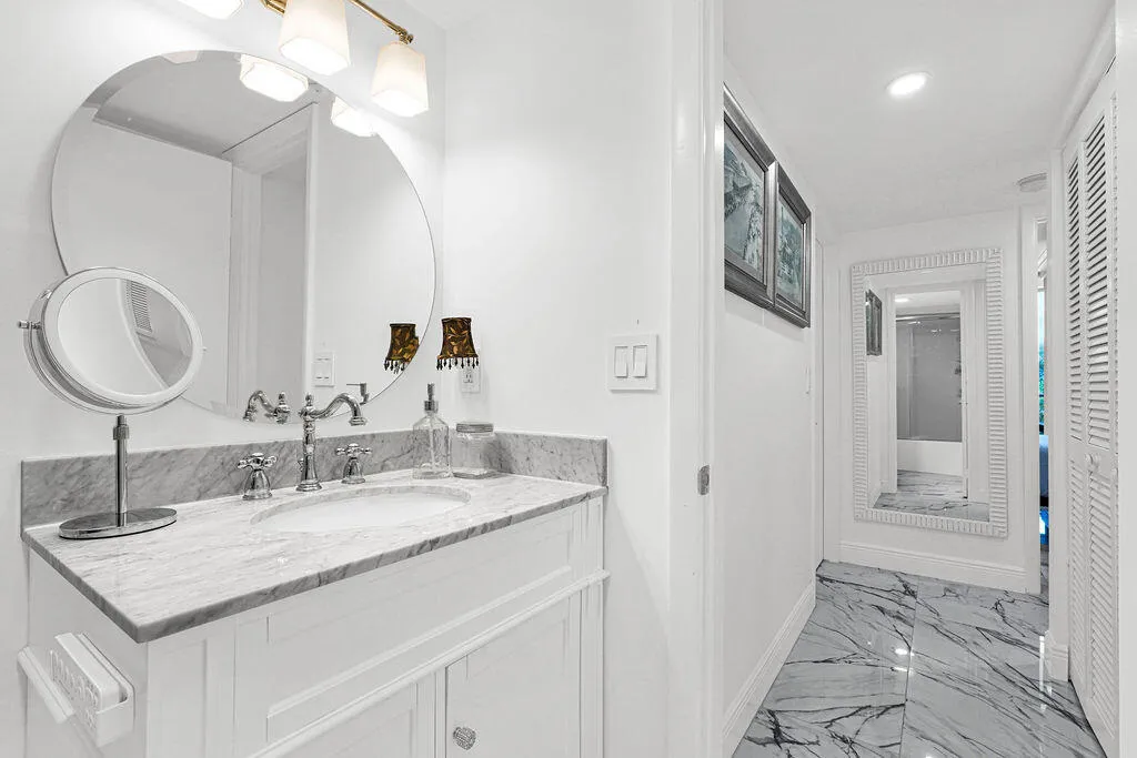 2nd bath with lighted/heated mirror, Hi Tech auto flush commode