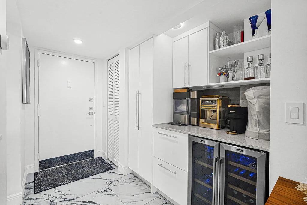 Custom coffee counter niche with pantry and wine cooler