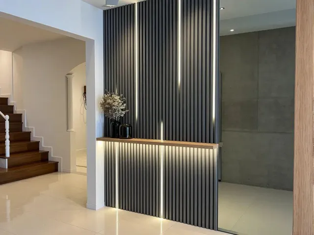 Designer wall panels and custom built-ins professionally installed and included with the home.