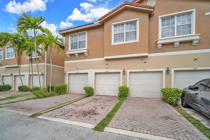 1 car garage and parking with driveway.