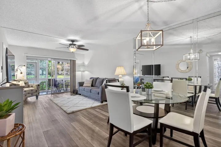 Open dining and living room with lake view