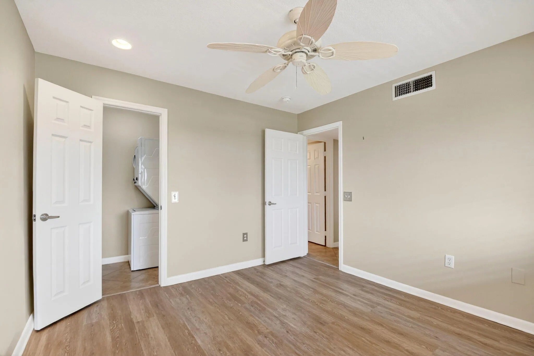 Front bedroom with Washer/Dryer in the closet.