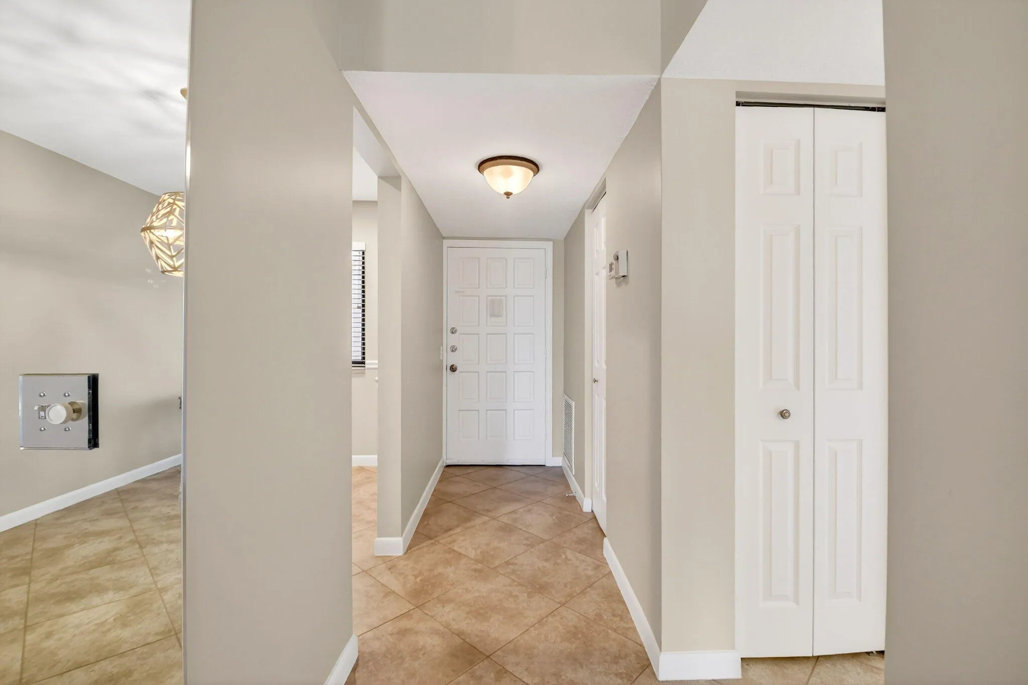 From Back of the hallway, looking towards front door.