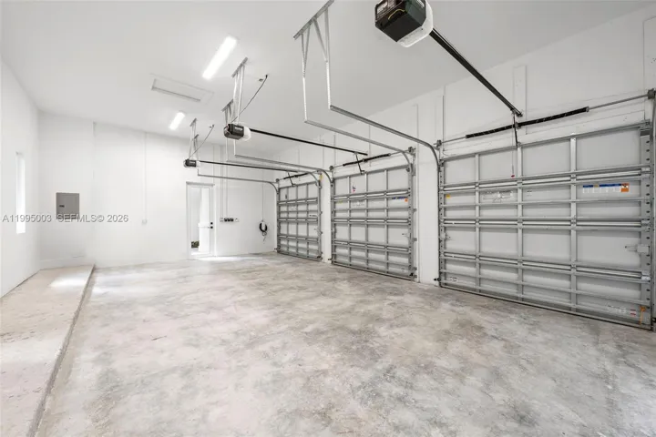 2 nd 3 car garage Total 6 car garages , all se3t up for electric cars