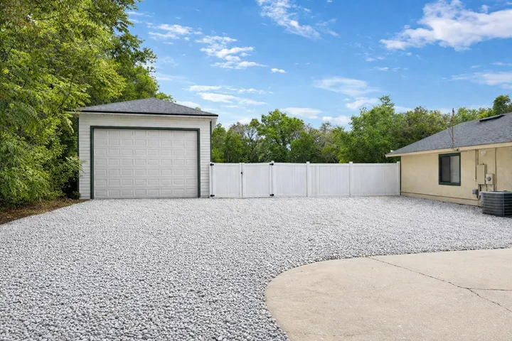 Detached Rv Garage & Extended Gravel Parking