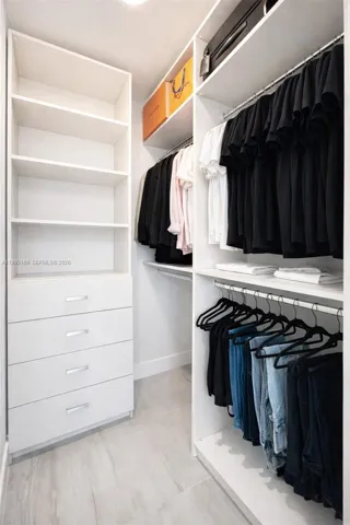 Custom-designed closet maximizing storage and organization