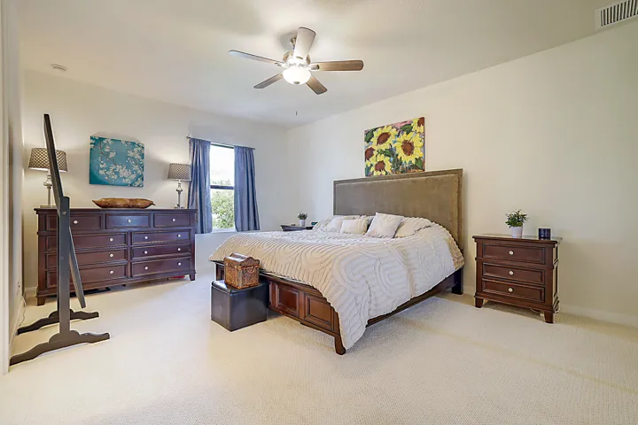The large primary bedroom with it's ensuite bathroom and generous closet space