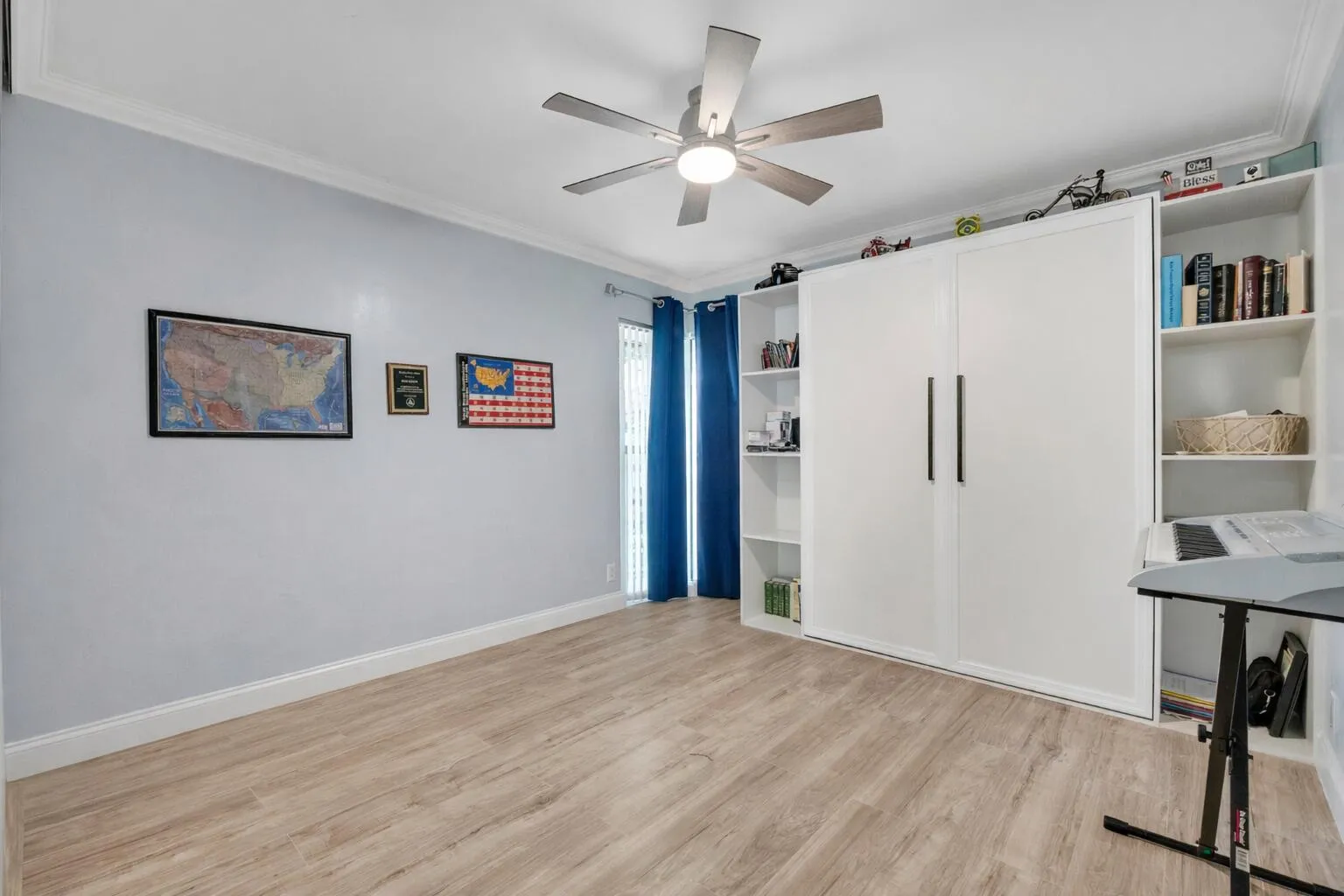 Modern room with Murphy bed and keyboard