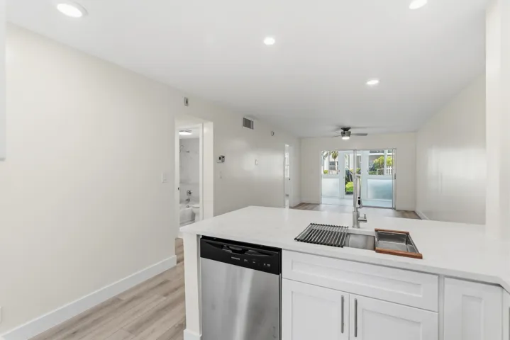 A brand NEW custom kitchen with quartz countertops, Eat in Bar, soft-close cabinets, stainless-steel appliances and ALL NEW ELECTRIC, PLUMBING, AC, AND HWH!
