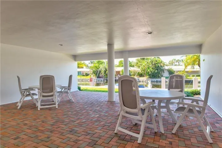 BEACH AND BOAT LOVERS DREAM LOCATION!.., FEATURING PRIVATE DEEDED BEACH ACCESS, COMMUNITY BOAT DOCK, NO FIXED BRIDGES, 1 CANAL FROM THE INTRACOASTAL WITH 6 BOAT SLIPS! Located in desirable North Leisure Gardens COMPLETELY REMODELED 2-bed, 2-bath, 1st floor, corner unit features EVERYTHING BRAND NEW!, a custom kitchen with quartz countertops, soft-close cabinets, stainless-steel appliances and ALL NEW, ELECTRIC, PLUMBING, HWH AND AC UNIT.