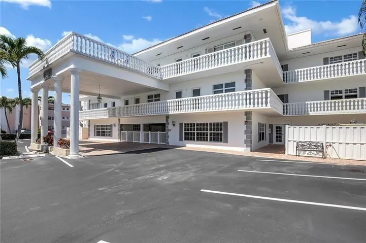 BEACH AND BOAT LOVERS DREAM LOCATION!.., FEATURING PRIVATE DEEDED BEACH ACCESS, COMMUNITY BOAT DOCK, NO FIXED BRIDGES, 1 CANAL FROM THE INTRACOASTAL WITH 6 BOAT SLIPS! Located in desirable North Leisure Gardens COMPLETELY REMODELED 2-bed, 2-bath, 1st floor, corner unit features EVERYTHING BRAND NEW!, a custom kitchen with quartz countertops, soft-close cabinets, stainless-steel appliances and ALL NEW, ELECTRIC, PLUMBING, HWH AND AC UNIT.