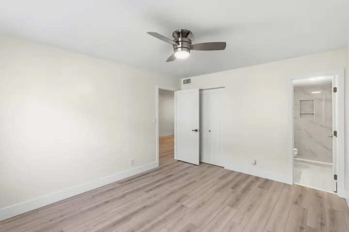 PRIMARY BEDROOM WITH ENSUITE
