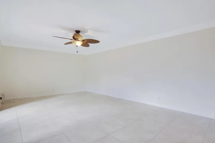 Neutral tile covers the first floor.