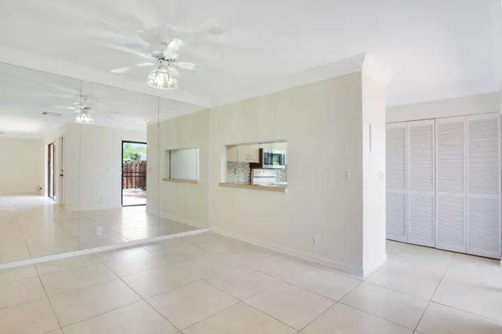 A dining area is conveniently is located next to the kitchen.