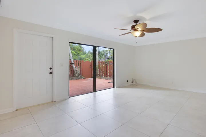 Sliding glass doors throughout the home provide generous sunlight.