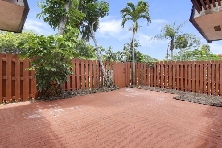 The patio is fully fenced.