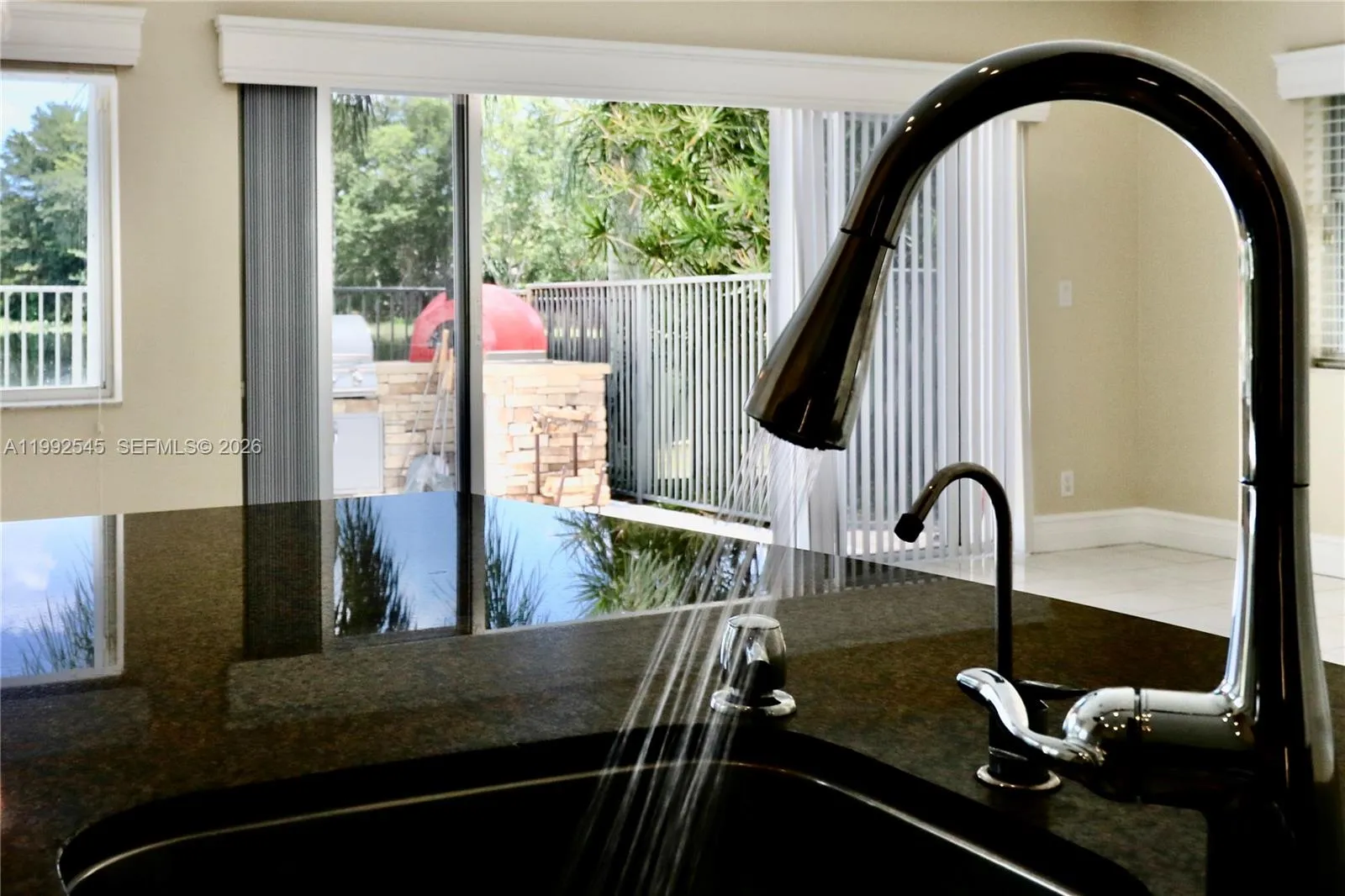 View outside and access to the BBB area from the kitchen