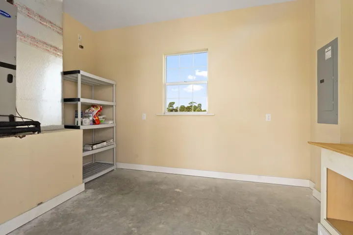 Storage Room accessible from back porch.