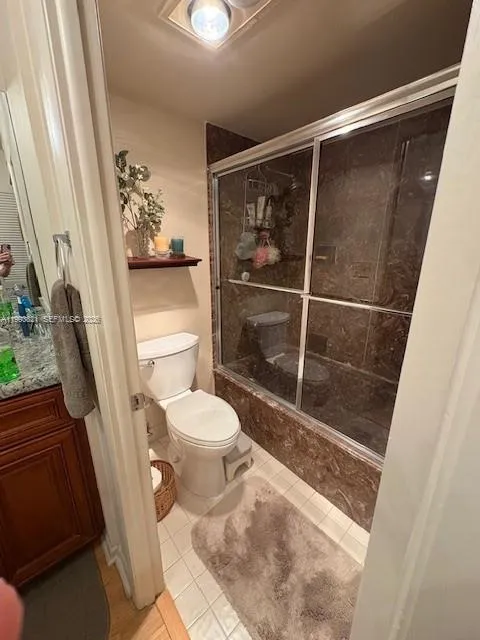 master bathroom off of dressing area and sink area