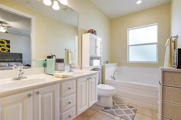 Dual sinks, with seperate tub, and a shower.