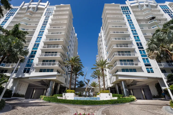Beautiful landscaping greets you, with a sculpture that captures the south florida sun, complimentary valet for yours guests for a 5 star experiance.