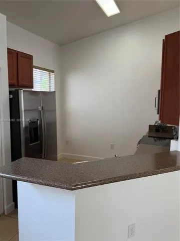 Nice sized kitchen with brand new stainless steel appliances.