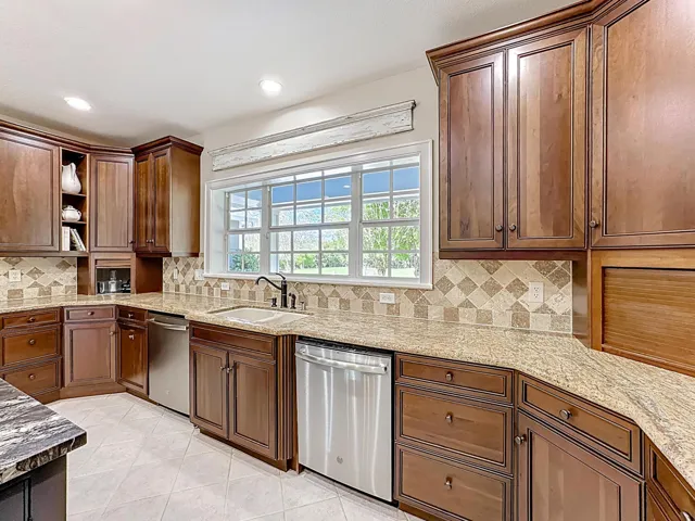 Kitchen also has 2 dishwashers! On either side of sink