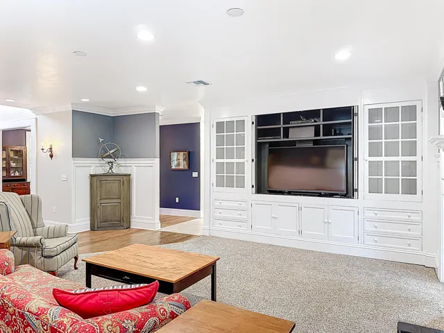 TV with cabinet doors open