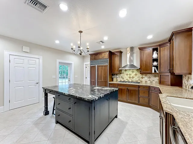View of Gas range - also gas water heater and dryer.