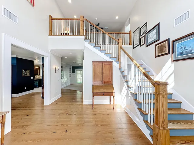 Foyer with wide-plank Sthn Yellow Pine flooring