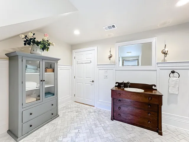 Upstairs bathroom with lots of unique storage