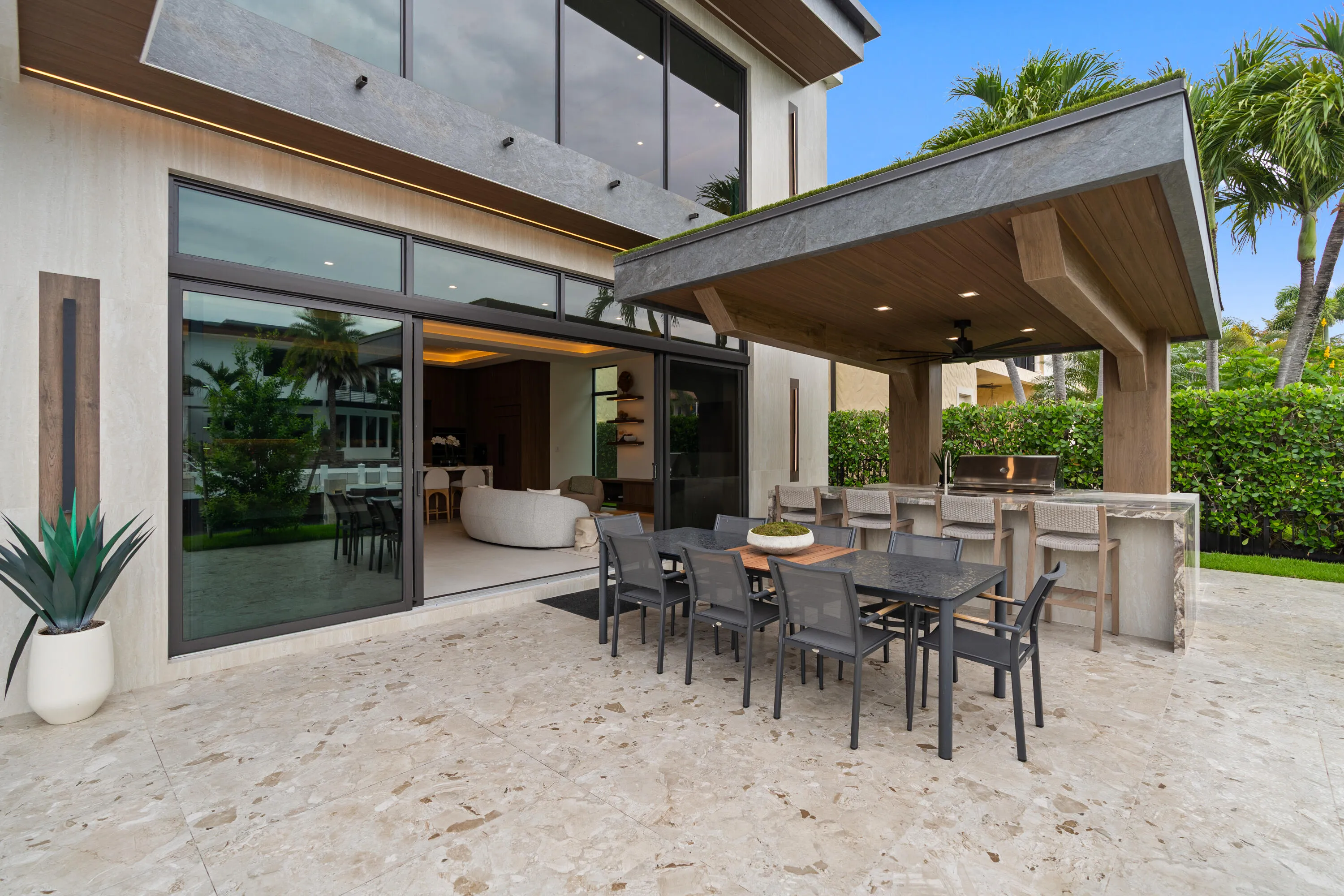 OUTDOOR DINING AREA & KITCHEN
