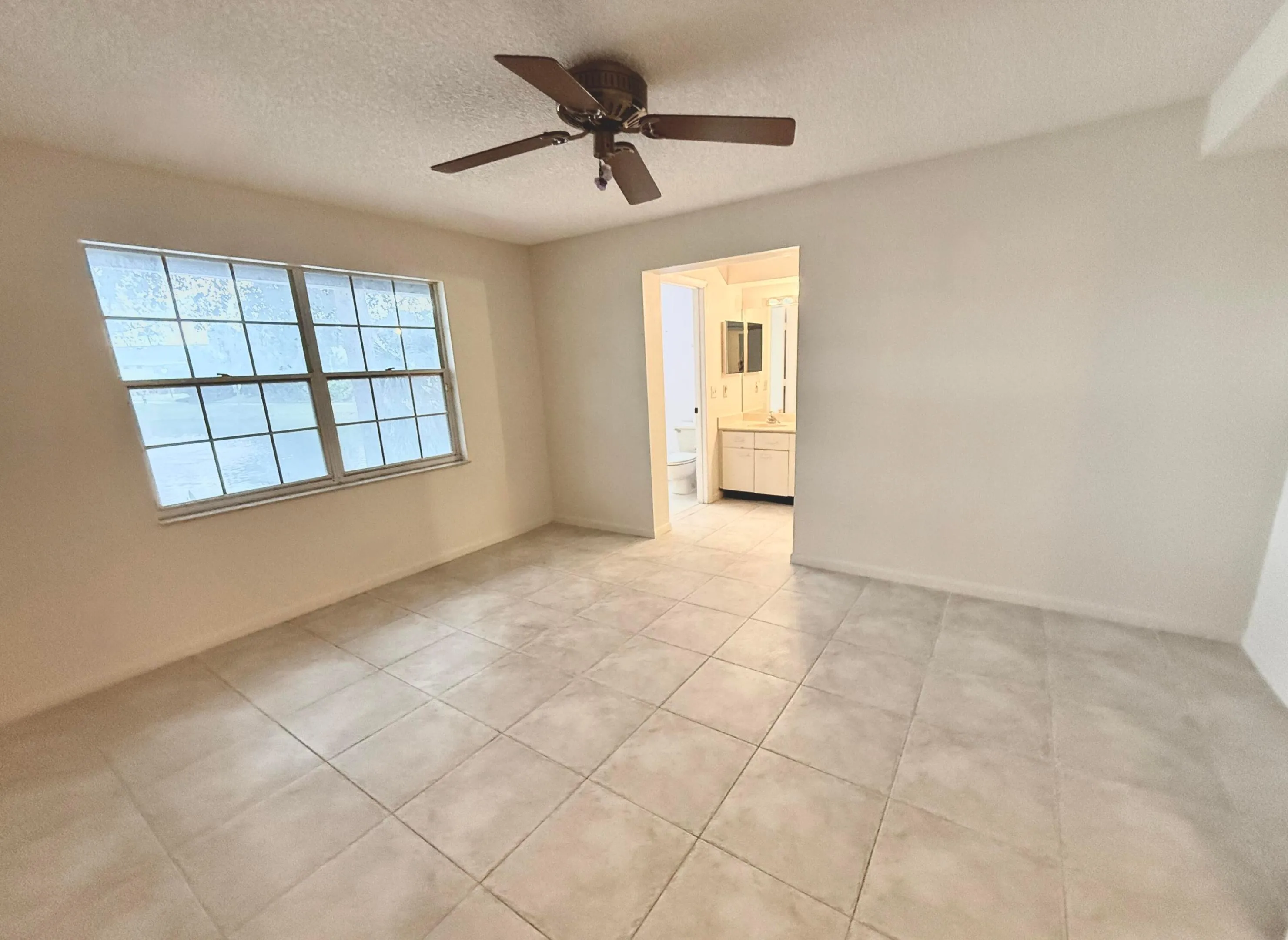 PRIMARY BEDROOM NOW EMPTY/REALTOR PIC NOT PROFESSIONAL