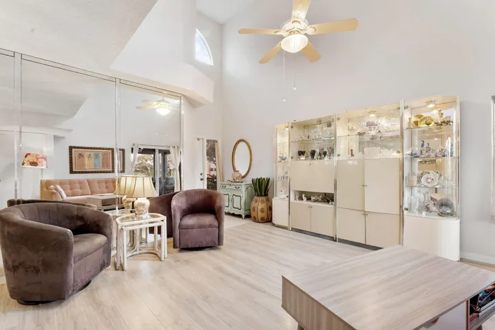 Living dining with cathedral ceilings 2+ stories tall