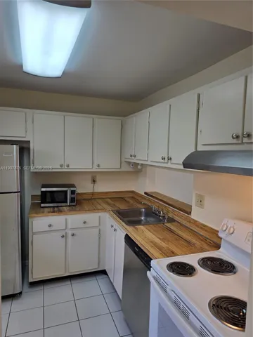 cabinets, painted interiors and knobs added