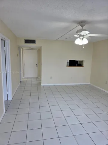 off kitchen with pass thru window