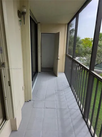with storage room , screened and tiled