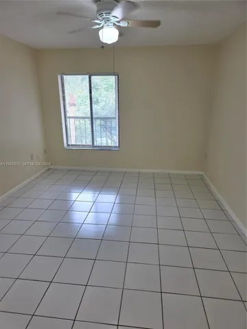 tiled and with window overlooking balcony