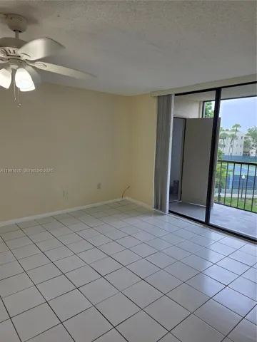 tiled and with sliding doors leading to balcony with great view