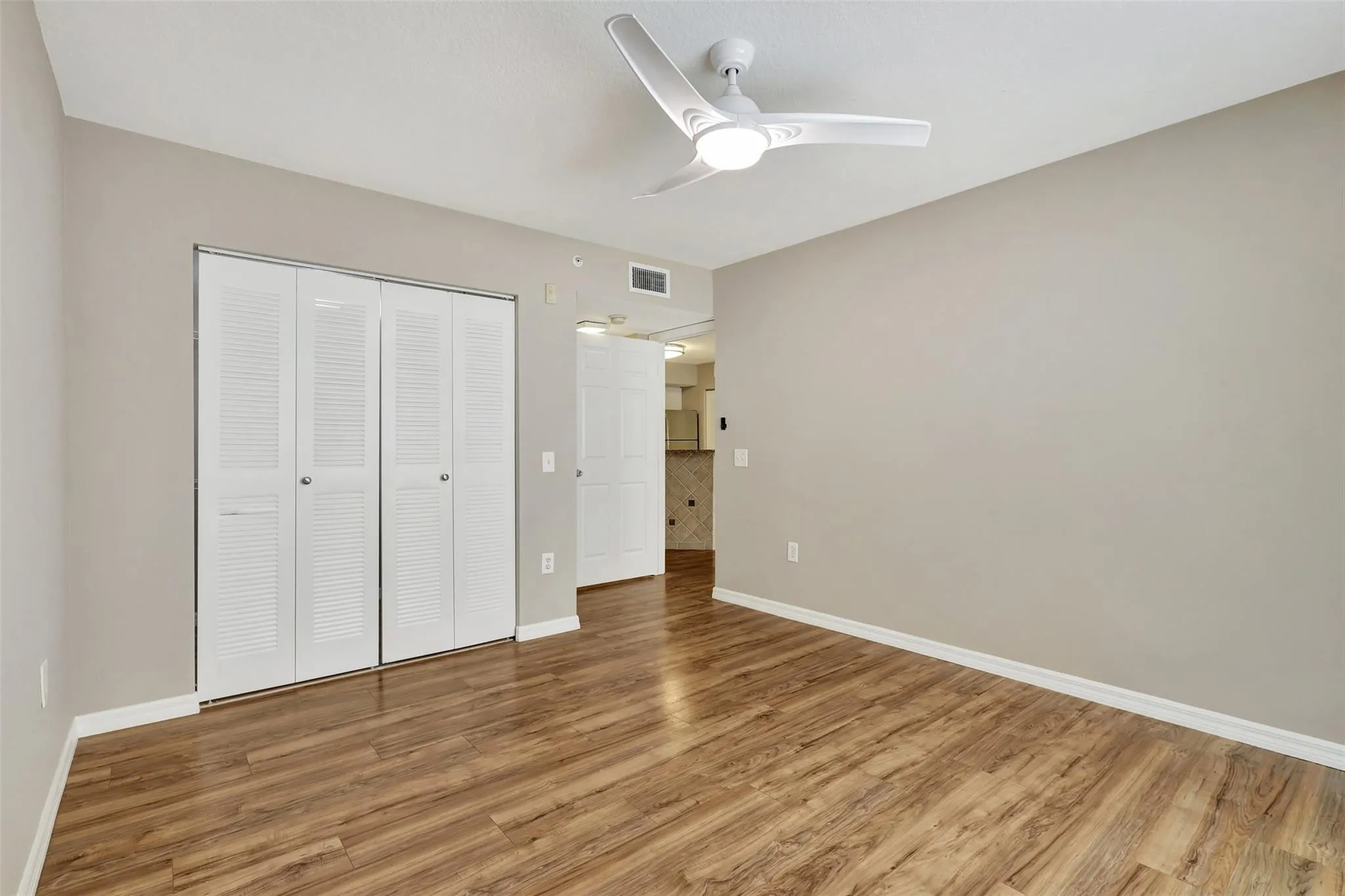 Spacious Primary Bedroom with Walk-in Closet and en-suite Bath.