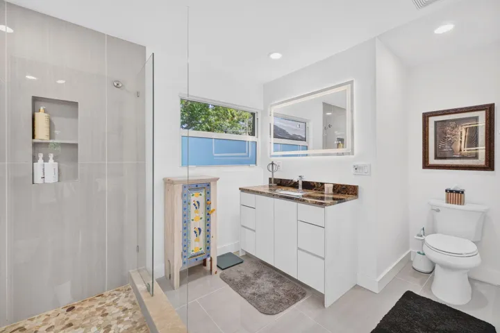 Primarty En-suite Bathroom with double sink & large shower.