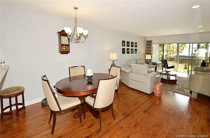 Enjoy an open, airy layout with seamless flow from dining to living area, all leading out to the screened lanai—perfect for relaxing, entertaining, and enjoying the Florida lifestyle