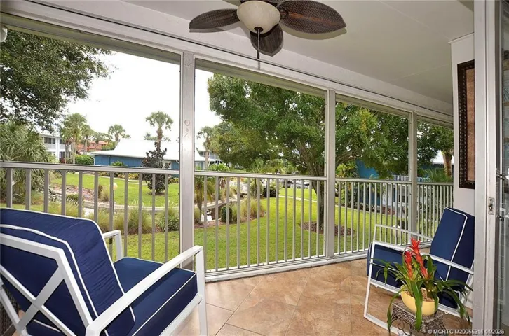 This oversized screened lanai truly feels like an outdoor living room—perfect for relaxing or entertaining while enjoying serene green space and water views with gentle Florida breezes.