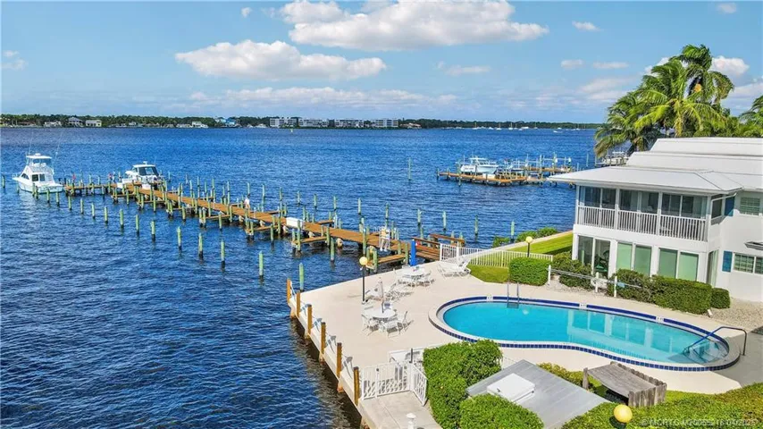 Enjoy true Florida living with three heated pools (this pool is the Riverfront pool, waterfront lounging areas, and boat docks just steps away—perfect for boating, relaxing, and soaking in the coastal lifestyle